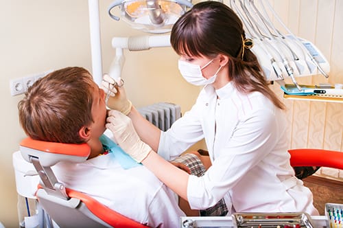 patient and hygienist during general dentistry appointment